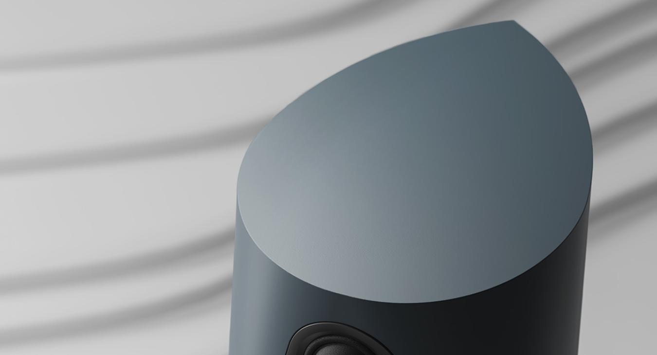 The grey looking top of a 360 speaker