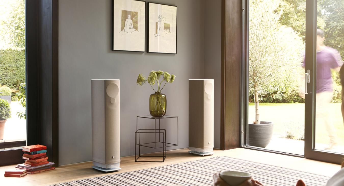 A pair of Linn Series 5 530 Exakt Active Loudspeakers in butterscotch in a living area
